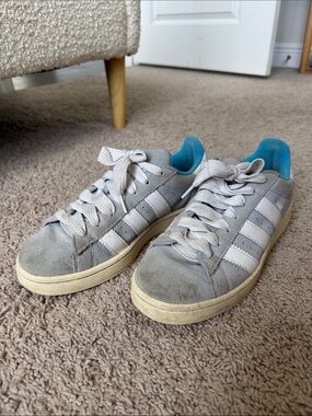 Light Gray Suede Sneakers with White Stripes and Teal Lining